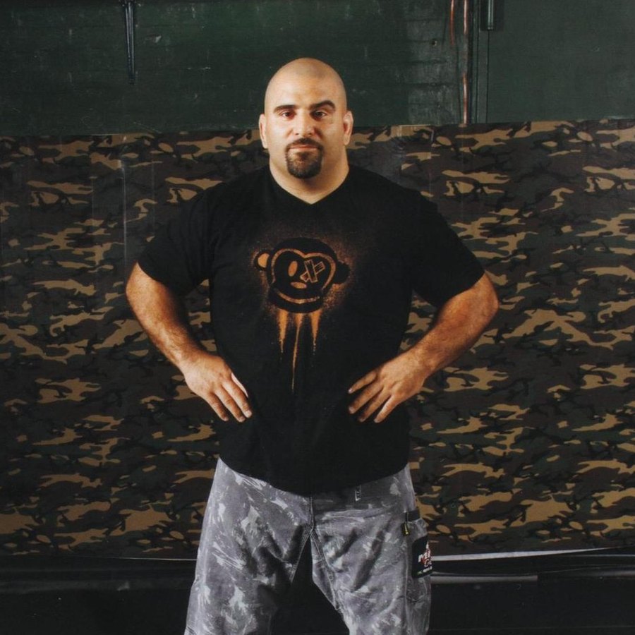 Master Chim standing in his academy